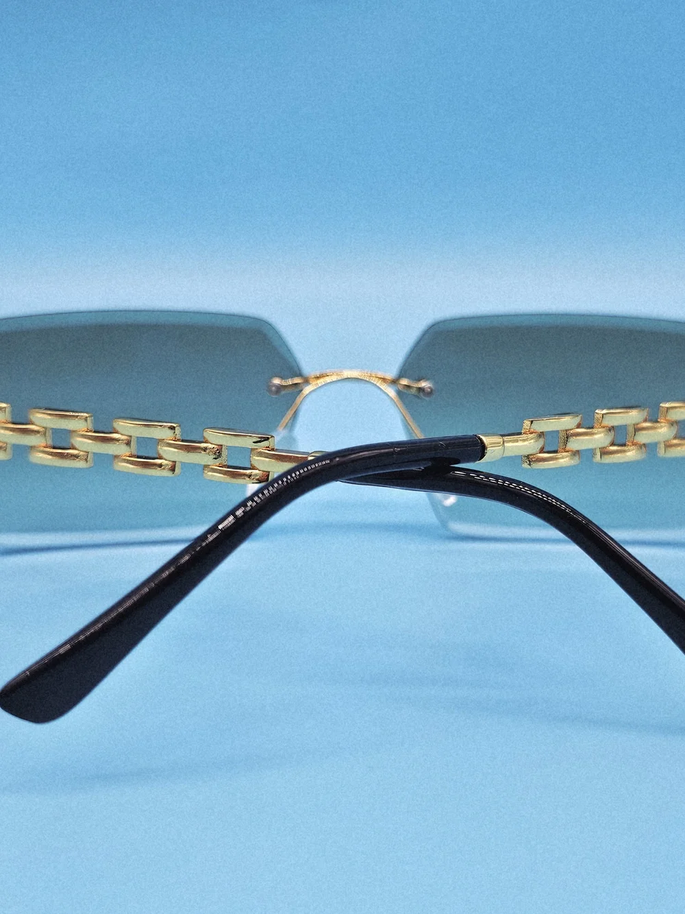 Gold-Accented Rimless Gray Sunglasses - Unisex Accessories